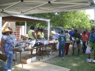 Volunteers distribute food and water at Mount Zion Baptist Church in Sandbranch, Texas.Eugene Keahey